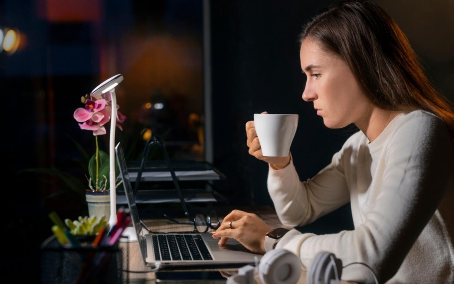 Canadian investor reviewing market data and investment performance on computer screen